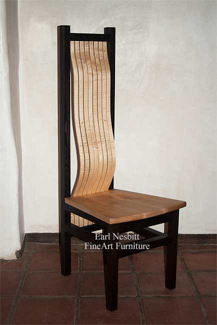 custom made comfortable dining chair showing solid curly maple seat